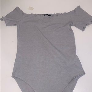 grey bodysuit